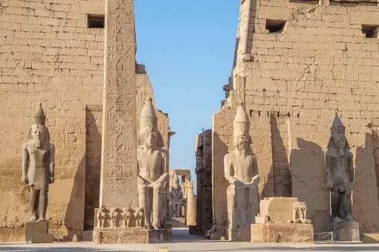 Monumental statues at a Luxor temple entrance