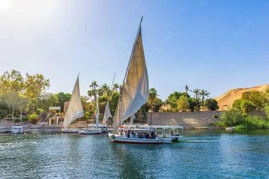 Traditional Nile feluccas sailing near Luxor