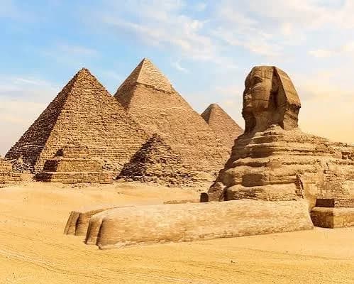 The Giza Pyramids and the Great Sphinx under a clear blue sky